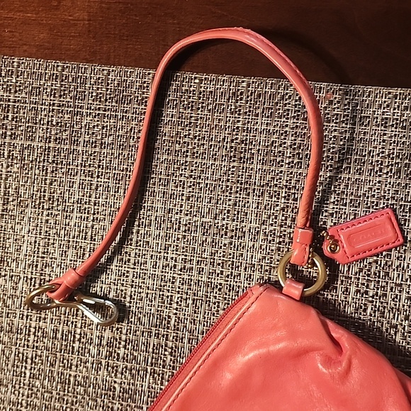 This is a Coral Coach Clutch.It is slightly used, but the perfect bag for summer - Picture 3 of 5